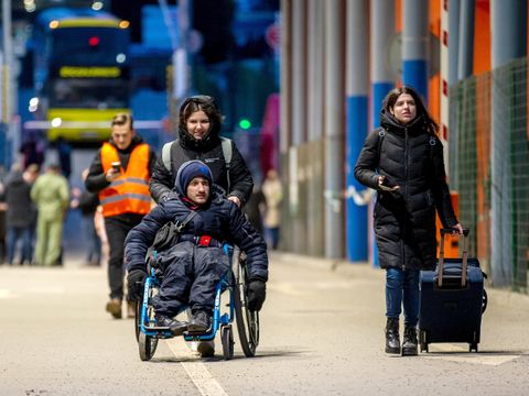 Geflüchtete im Rollstuhl